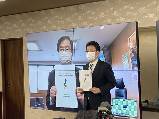 左から 吉田 学 厚生労働事務次官(画面) 大西 一史 熊本市長